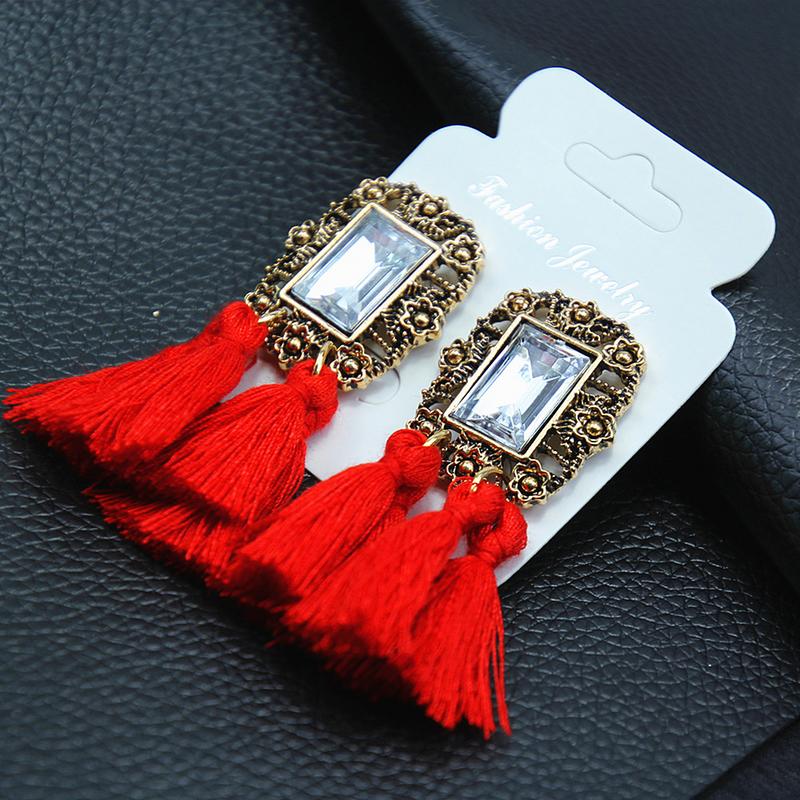 Arihant Red & Gold-Toned Copper-Plated Stone-Studded Tassel Earrings 45089