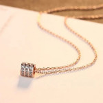 Arihant Rose Gold Plated Stainless Steel CZ Cylindrical Pendant with 3 Linked Loops