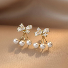 Arihant Gold Plated Korean Bow Tie Pearl Stud Earrings