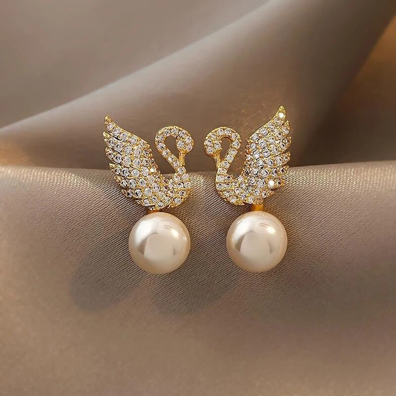 Arihant Gold Plated Korean AD Swan Pearl Stud Earrings