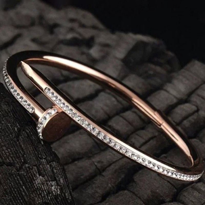 Arihant Rose Gold Plated Stainless Steel Anti Tarnish AD Studded Nail Bracelet