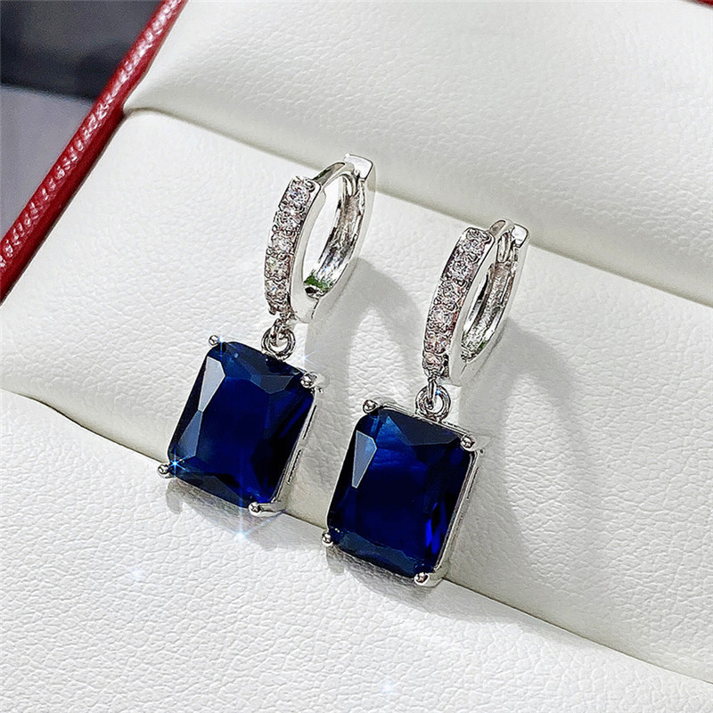 Arihant Silver Plated Navy Blue Rectangular AD Studded Crushed Ice Cut Drop Earrings