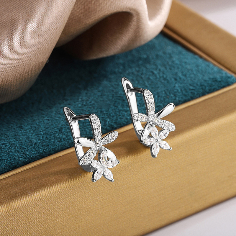 Arihant Silver Plated American Diamond Studded Dual Star Shaped Earrings