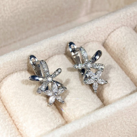 Arihant Silver Plated American Diamond Studded Dual Star Shaped Earrings