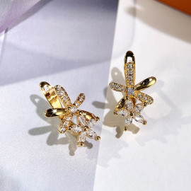 Arihant Gold Plated American Diamond Studded Dual Star Shaped Earrings