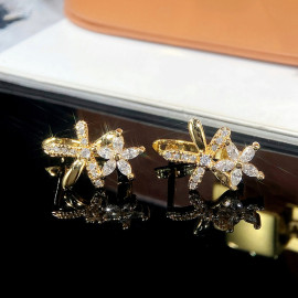 Arihant Gold Plated American Diamond Studded Dual Star Shaped Earrings