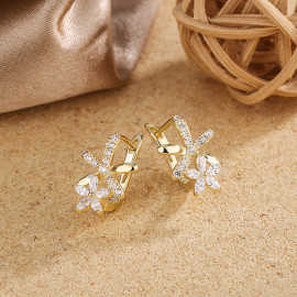 Arihant Gold Plated American Diamond Studded Dual Star Shaped Earrings