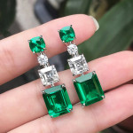 Arihant Silver Plated American Diamond Studded Green Geometrical Crushed Ice Cut Drop Earrings