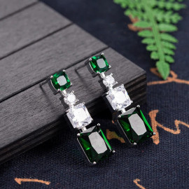 Arihant Silver Plated American Diamond Studded Green Geometrical Crushed Ice Cut Drop Earrings