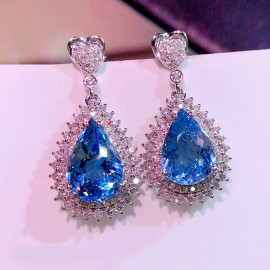 Arihant Silver Plated American Diamond Studded Blue Teardop Shape Ice Cut Drop Earrings