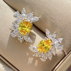 Arihant Silver Plated American Diamond Studded Yellow Crushed Ice Cut Stud Earrings