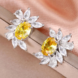 Arihant Silver Plated American Diamond Studded Yellow Crushed Ice Cut Stud Earrings