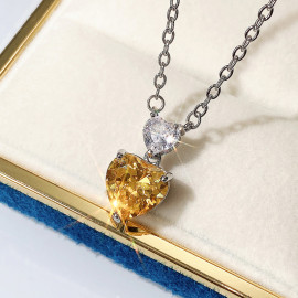 Arihant Silver Plated American Diamond Studded Yellow Heart Shape Pendant