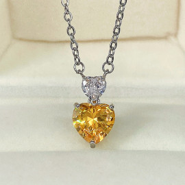 Arihant Silver Plated American Diamond Studded Yellow Heart Shape Pendant