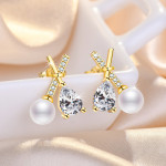 Arihant Gold Plated American Diamond Studded Cross Shape Korean Stud Earrings