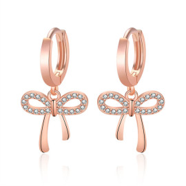 Arihant Rose Gold Plated American Diamond Studded Bow-Tie Shape Korean Stud Earrings