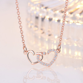 Arihant Rose Gold Plated American Diamond Studded Dual Heart Contemporary Korean Pendant