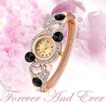 Arihant Rose Plated American Diamond Black Designer Bracelet Watch 9111